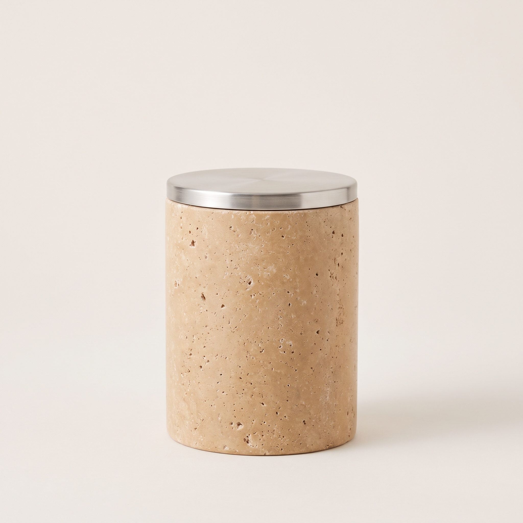 Supper Pillar Candle, Coconut and soy wax candle in a tall honed travertine cylinder with a brushed steel lid, 3.5 inches wide by 6 inches tall, 14 ounces, warm sand